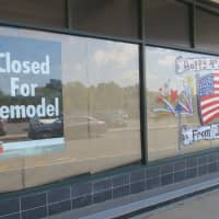 <p>One sign outside D&#x27;Agostino market said, &quot;Closed For Remodel&quot; while another said &quot;Happy 4th July From Dag&#x27;s.&quot;</p>