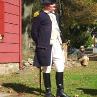 <p>A re-enactor plays the role of George Washington on the 235th Anniversary of the Battle of White Plains in 2011.</p>