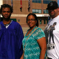 <p>Jesse Marino, left, with his parents Rhonda Marino and Paul Marino, before the Warren Harding High School graduation ceremonies. </p>