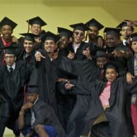 <p>Seniors celebrate as Bridgeport Central High School holds its 2015 commencement ceremony Monday at Webster Bank Arena.</p>