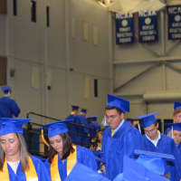 <p>The graduates head into the ceremony. </p>