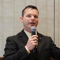 <p>West Point&#x27;s Dave Jones speaks at the Stamford Board of Realtors meeting in June.</p>