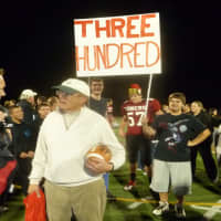 <p>Somers coach Tony DeMatteo, in white, won the 300th game of his 43-year career at Roosevelt of Yonkers and Somers.</p>