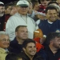 <p>Somers coach Tony DeMatteo, center, surrounded by coaches and former players.</p>