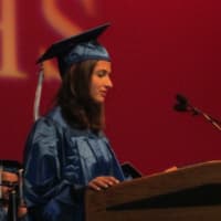 <p>Elizabeth Kingsley delivering her valedictorian address at Byram Hills High School graduation ceremony.</p>