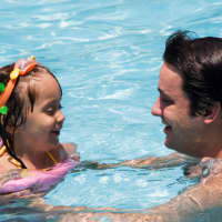 <p>The White Plains YWCA suggests adults help teach their children the importance of knowing basic swimming skills.</p>