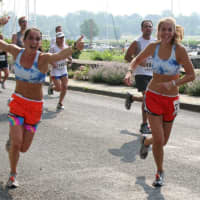 <p>Two runners enjoy the race.</p>