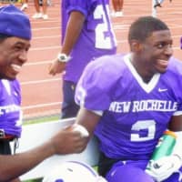<p>New Rochelle quarterback Khalil Edney, left, and running back Jason Ceneus, each had two touchdowns. Edney passed for two and Ceneus ran for a pair.</p>