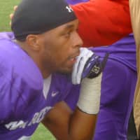 <p>New Rochelle defensive back Terrnace Holden rests after his interception.</p>