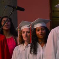 <p>Fox Lane High School graduates (and future graduates) participate in a choir performance.</p>