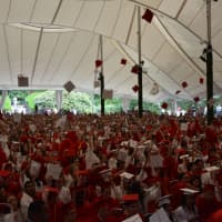 <p>Fox Lane High School&#x27;s newly minted graduates celebrate by throwing their mortarboards into the air.</p>