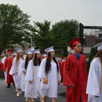 <p>Somers High School&#x27;s 2015 graduates head to their commencement.</p>