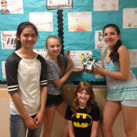<p>Pierre Van Cortlandt Middle School students display their robot.</p>
