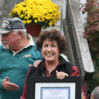 <p>Jack and Ronnie Waltzer receive an award for their contribution to the Peach Lake community.</p>