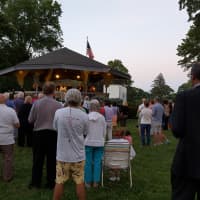 <p>About 70 people were at the June 25 candlelight vigil that honored the nine victims of the recent massacre in Charleston, S.C.</p>