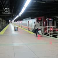 <p>A commuter rushes to catch the last train to leave Grand Central Terminal Sunday just after 7 p.m.</p>