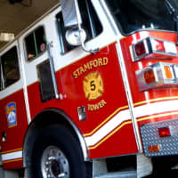 <p>Stamford firefighters rescued 12 people from a sinking boat Monday afternoon.</p>