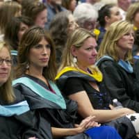 <p>CHS faculty members watch Thursday&#x27;s ceremony.</p>