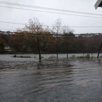<p>A portion of Riverside Avenue was flooded Monday afternoon following high tide.</p>