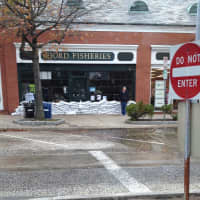 <p>Greenwich Daily Voice reader Caroline Lee submitted this picture of a flooded stretch of East Putnam Ave. in Cos Cob.</p>
