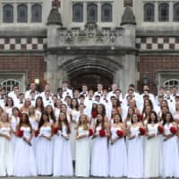 <p>Members of the Class of 2015 stand on the front steps June 20 at Bronxville High School during graduation ceremonies.</p>