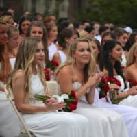 <p>Red roses and white gowns were the order of the day at Bronxville High School&#x27;s 93rd annual commencement.</p>