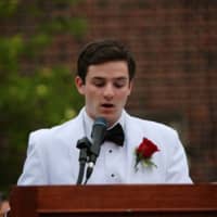<p>Class president Brendan Walsh gives the commencement address.</p>