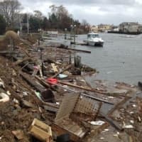 <p>Debris caused by Hurricane Sandy lines the shore at the end of Old Dam Road in Fairfield. </p>