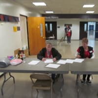 <p>American Red Cross employees work the New Rochelle Emergency Shelter at city&#x27;s Albert Leonard Middle School in the aftermath of Hurricane Sandy Tuesday.</p>