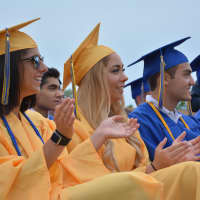 <p>Members of Mahopac High School&#x27;s class of 2015 give a round of applause at commencement.</p>