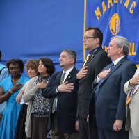<p>Mahopac school officials stand for the Pledge of Allegiance.</p>