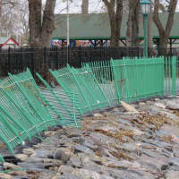 <p>Metal fencing was bent by Hurricane Sandy&#x27;s high winds at Playland Park in Rye. </p>
