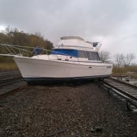 <p>This boat ended up on the tracks near Metro-North Railroad&#x27;s Ossining station due to Hurricane Sandy.</p>