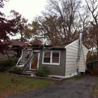 <p>A tree crashed into this house at 26 Forest Ave. in Danbury during the height of Hurricane Sandy.</p>
