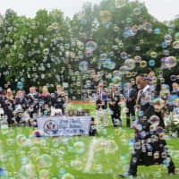 <p>Air horns and bubble machines added some extra drama to Thursday&#x27;s Commencement  at Rye Neck High School.</p>