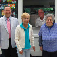 <p>David Moore, vice president of Greenwich Bank and Trust, and Jack, from Polar Petes Ice Cream, stand with River House members Margaret and Christina.</p>