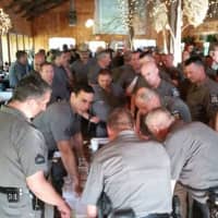 <p>State Police at a morning strategy meeting at the Titus Mountain Ski Area in the town of Malone as search efforts continue Saturday for Clinton Correctional Facility escapee David Sweat.</p>