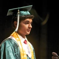 <p>Yorktown High Salutatorian Adarsh Subramani gives his address at Saturday&#x27;s graduation.</p>