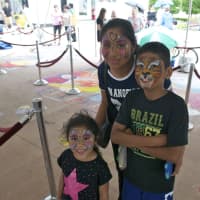 <p>Jazmin Silva. with her children, Steven and Angela, show off their face paintings. </p>