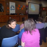 <p>Parents chatted and while their children enjoyed the movie at Dobbs Ferry&#x27;s Embassy Community Center.</p>