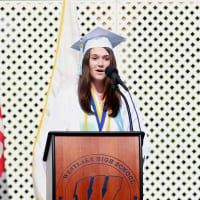 <p>Westlake High School senior Katie Cullen delivers the valedictory address on Friday.</p>