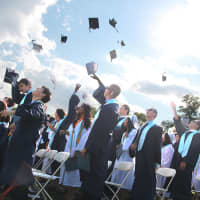 <p>It&#x27;s official. Westlake HIgh School graduates toss their caps to celebrate on Friday.</p>