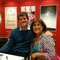 <p>Amada Abad, owner of Galapagos Books, with Brandon Stanton, author of Humans of New York.</p>