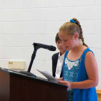 <p>Student government representatives Emma Windrum and Justin Craig speak at the ceremony.  </p>