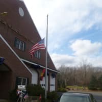 <p>Flags flew at half mast at the Easton Fire Department to memorialize Lt. Russell Neary, who was killed Monday night clearing downed trees and debris during Hurricane Sandy.</p>