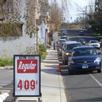 <p>Cars line up to get gas at the Citgo station on East Putnam Avenue in Greenwich. The Greenwich Police Department put cones up to help with traffic.</p>