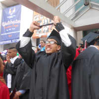 <p>Graduates excited about the end of their days at Riverside High School.</p>