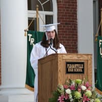 <p>Salutatorian Rosie Reilly addresses her fellow graduates.</p>