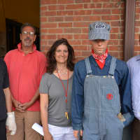 <p>Left to right: Bedford Hills Historical Museum members Richard Carmichael,  Richard Satenberg, Ellen Cohen and David Zapsky pose with a lifelike mannequin dressed in vintage railroad attire.</p>