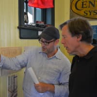 <p>David Zapsky (left) and Richard Carmichael (right) at the Bedford Hills railroad exhibit.</p>